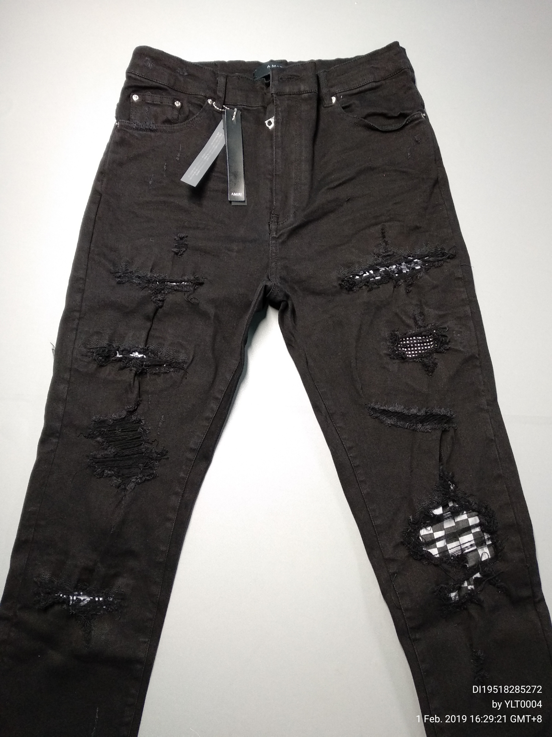 black and green amiri jeans